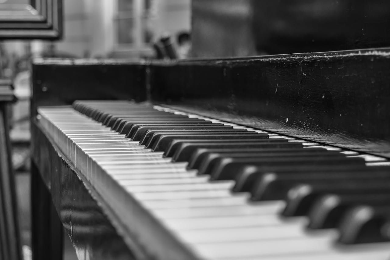Artistic black and white close-up of piano keys in shallow depth of field.